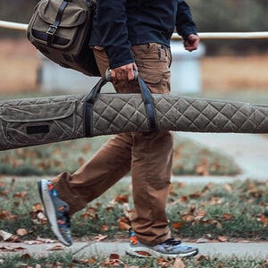 person carrying a Remington Gun Case