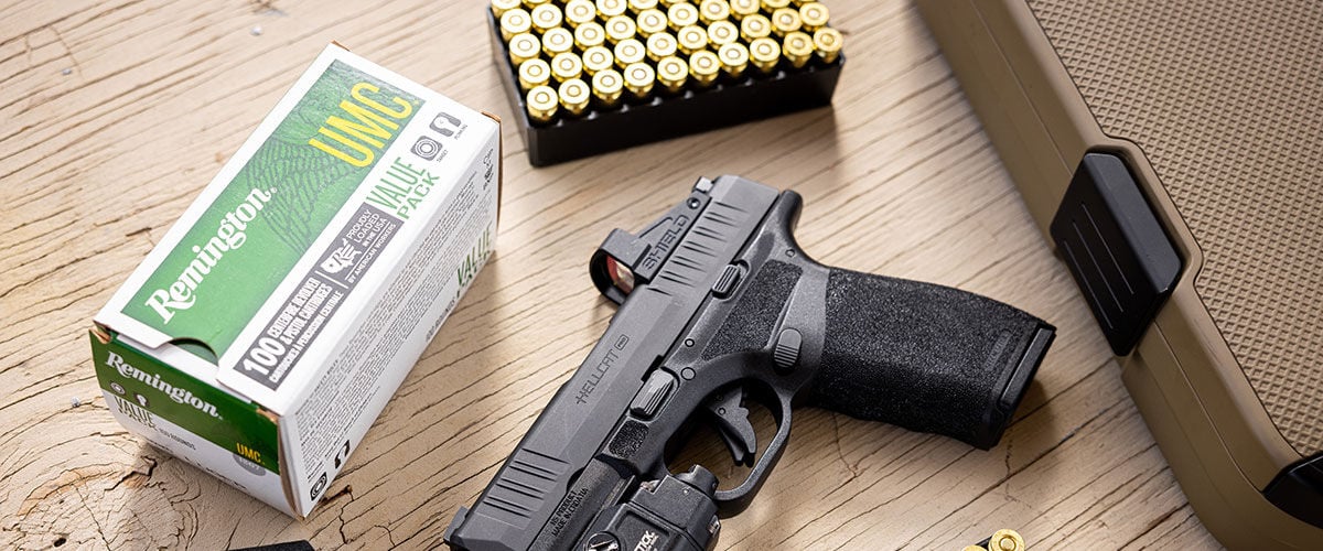 UMC handgun box and pistol laying on a table