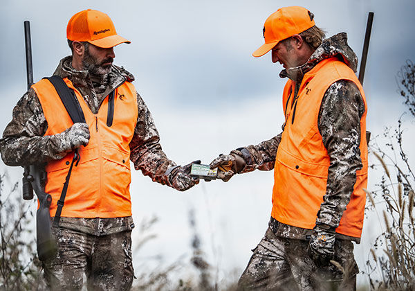 two hunters handing each other Premier AccuTip Sabot Slug