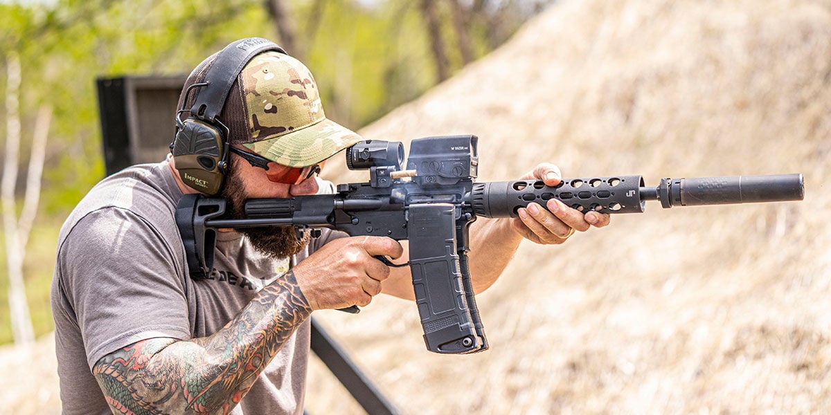 Josh Froelich aiming rifle