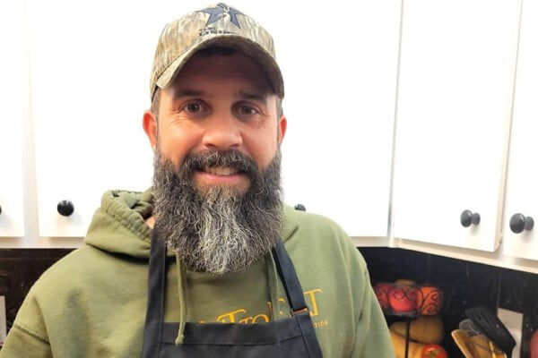 John Wallace standing in a kitchen