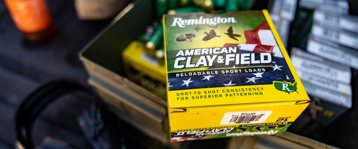 American Clay and Field box sitting on 2 ammo cans filled with ammunition