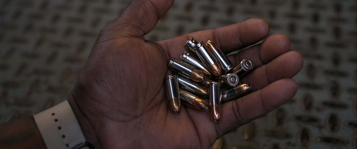 Remington handgun ammo in a hand
