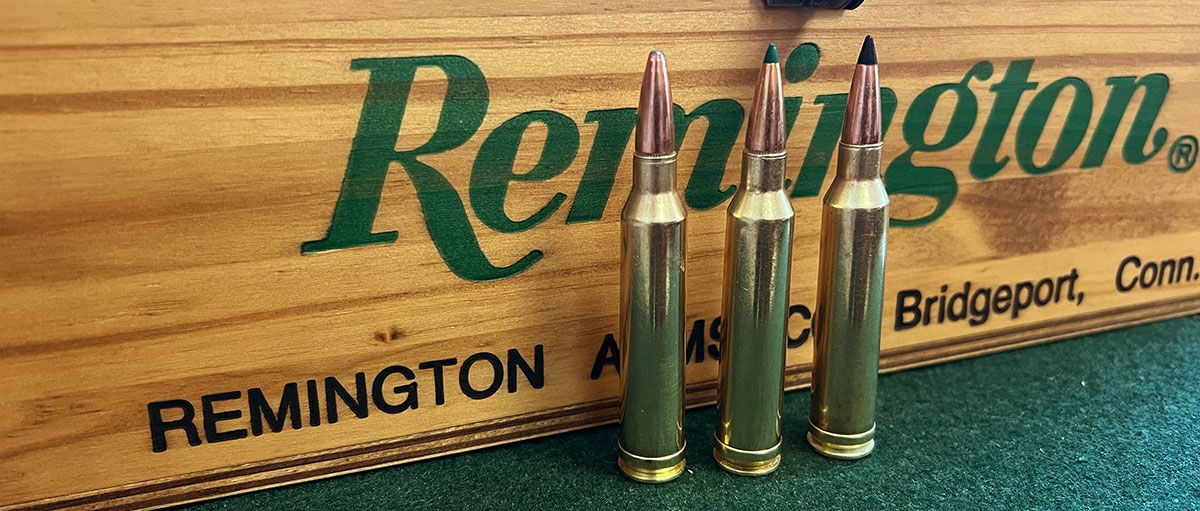 7mm Rem Mag cartridges standing in front of ammo box