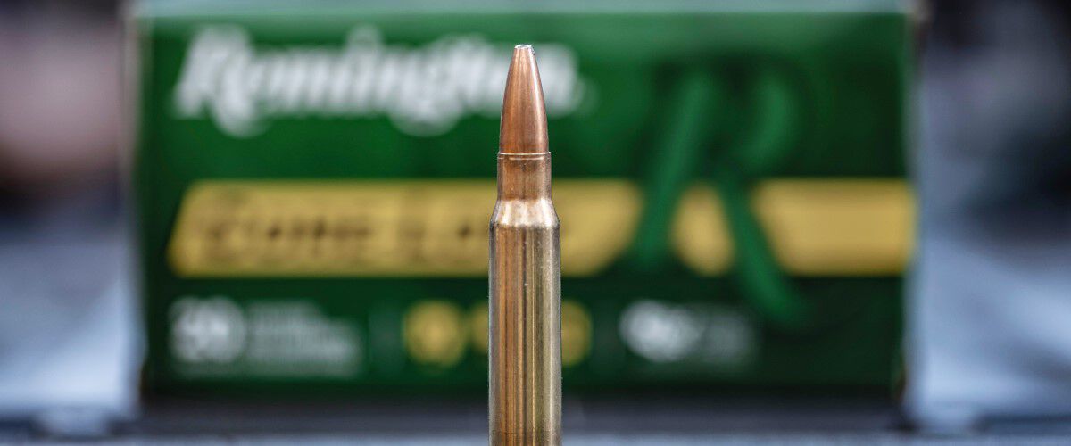 Remington Core-Lokt cartridge in front of the Core-Lokt packaging