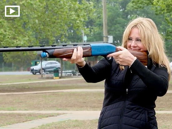 Nichole from Arkansas Style aiming shotgun