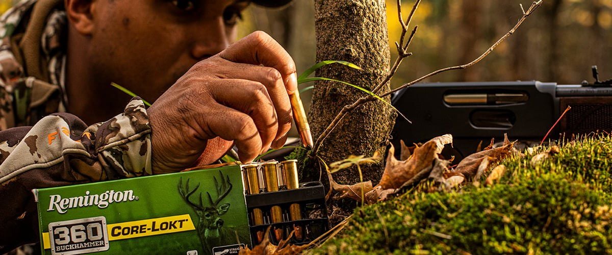 hunter loading 360 Buckhammer Core-Lokt into rifle