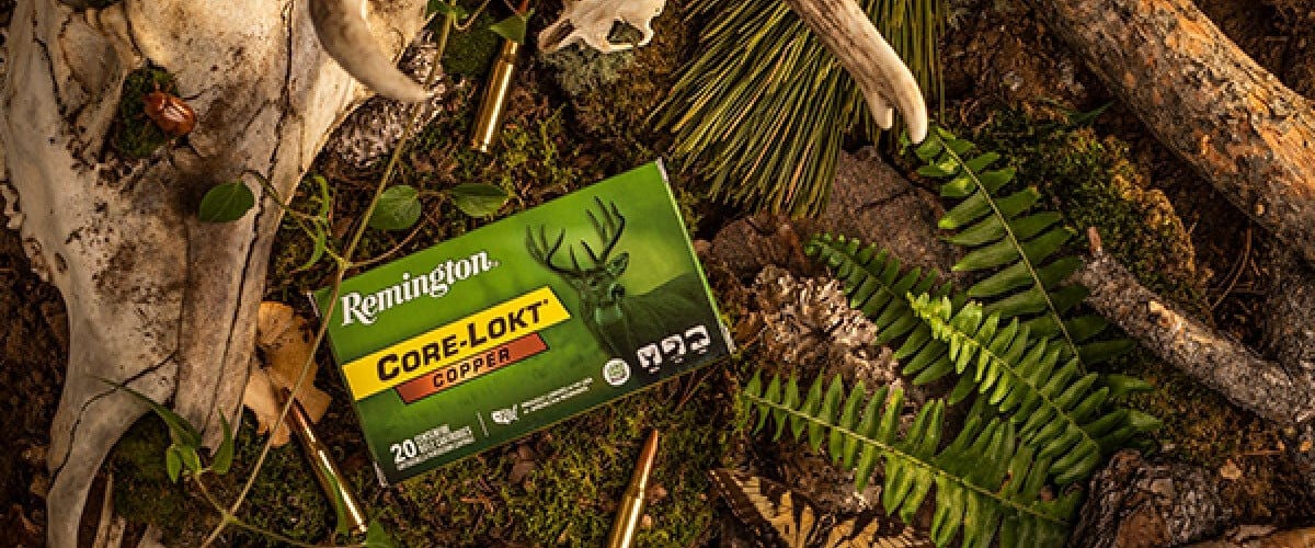 Core-Lokt Copper packaging on a table with a deer skull