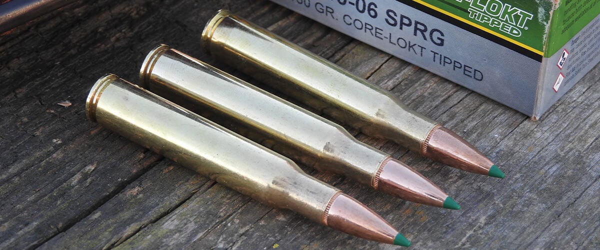 3 Core-Lokt Tipped cartridges laying on a table