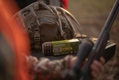 opened Core-Lokt 360 Buckhammer box next to a backpack and deer antler on a tailgate with a hunter in the foreground