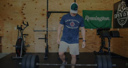 Matt Hewett standing in a gym