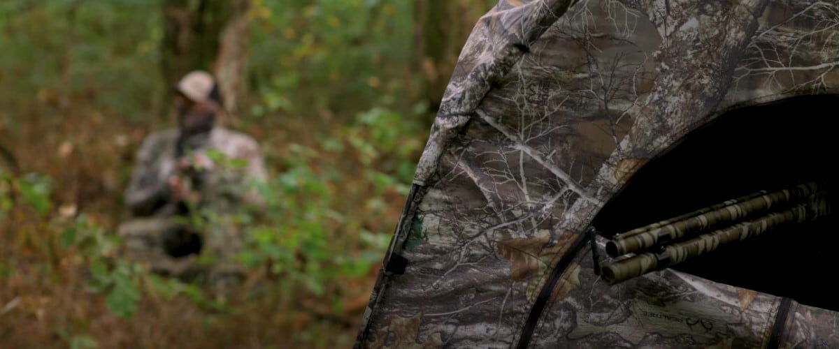 Adam Weis in a turkey hunting blind