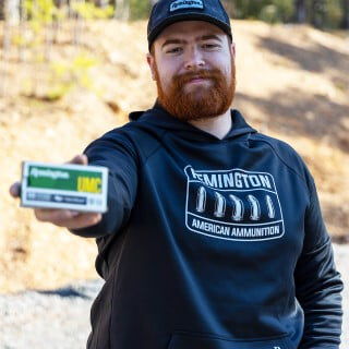 Ben Bell holding up a Remington UMC Ammo Box