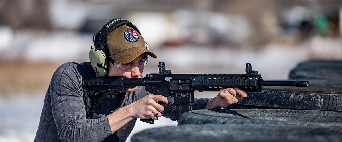 person holding a rifle