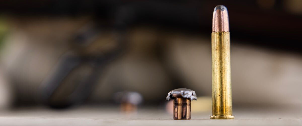 360 Buckhammer Cartridge standing on a table with a 360 Buckhammer Upset