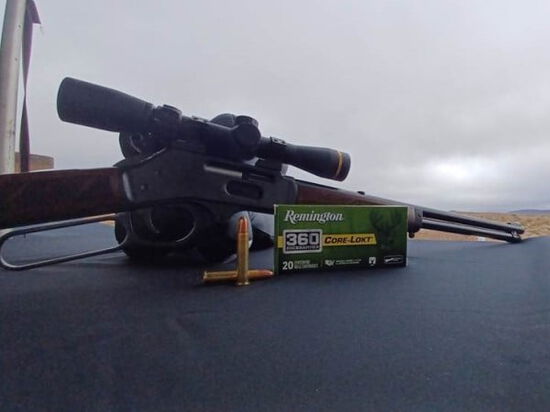 Lever Action Rifle sitting on a table with a box of Core-Lokt 360 Buckhammer