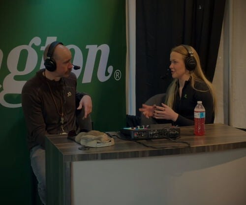 audrey and cal recording a podcast