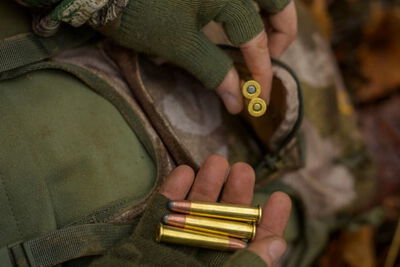 hunter removing 360 Buckhammer cartridges from a backpack