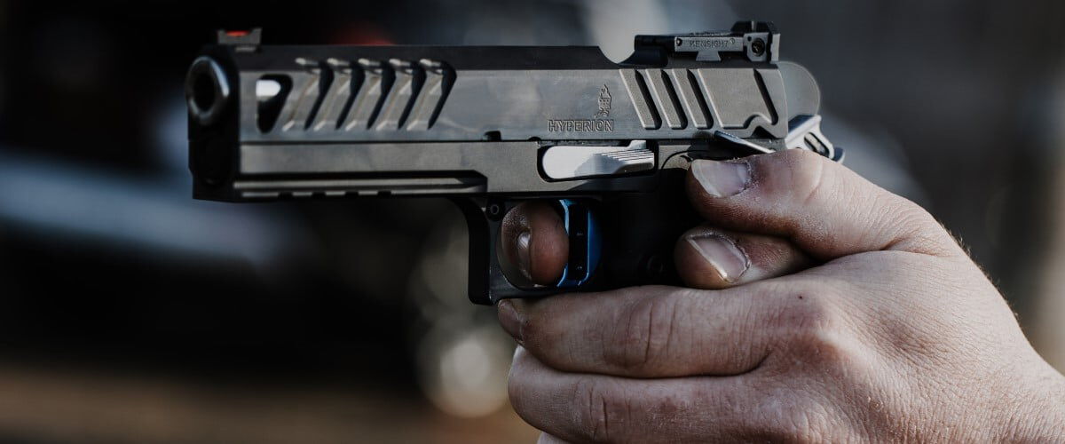 person holding a hyperion handgun