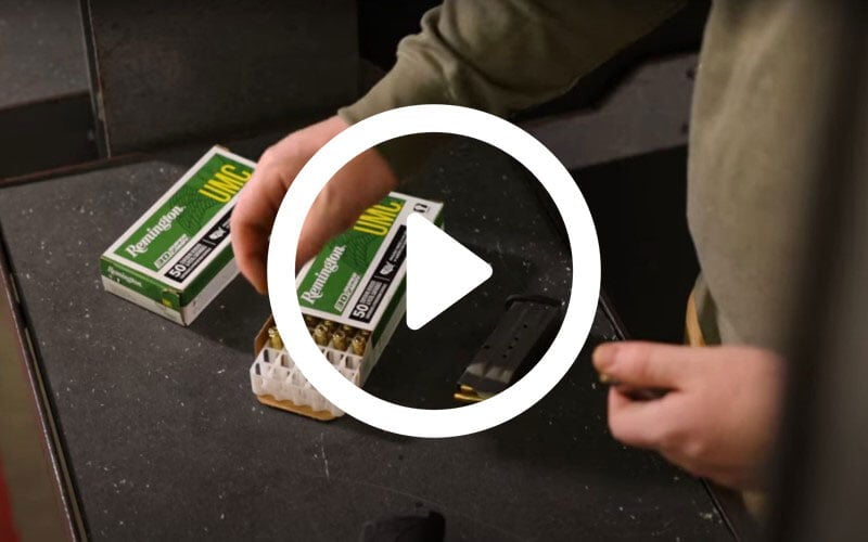 30 Super Carry cartridges being loaded into a magazine