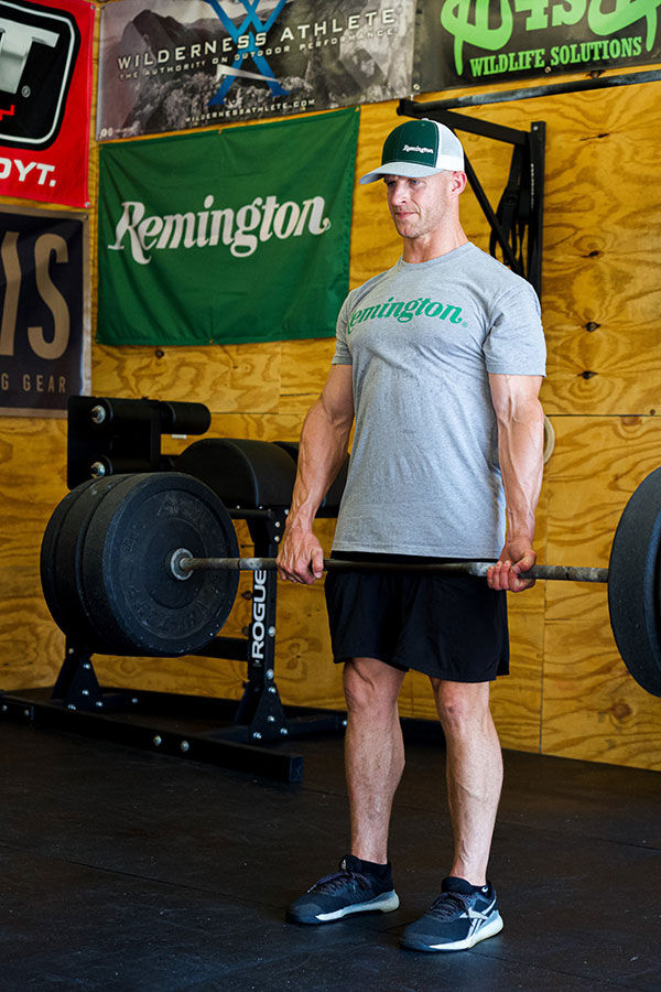 Matt Hewett lifting weights
