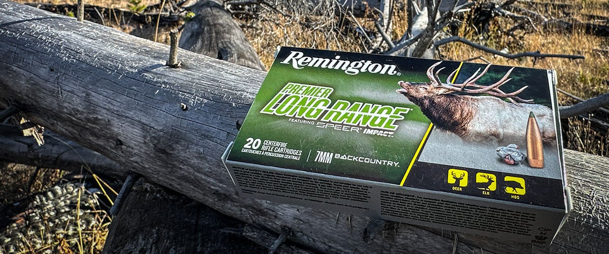 Premier Long Range box laying on a fallen tree