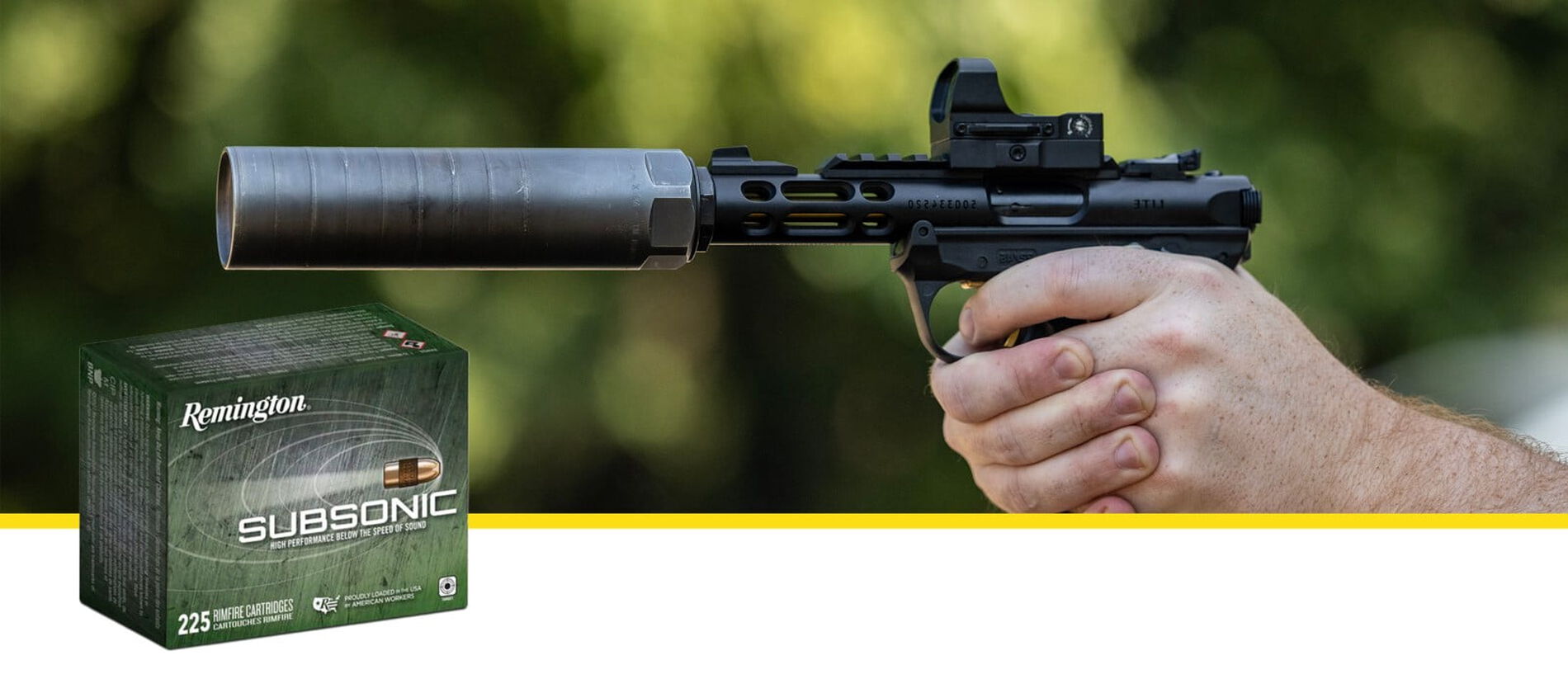 shooter aiming handgun with silencer with a subsonic package