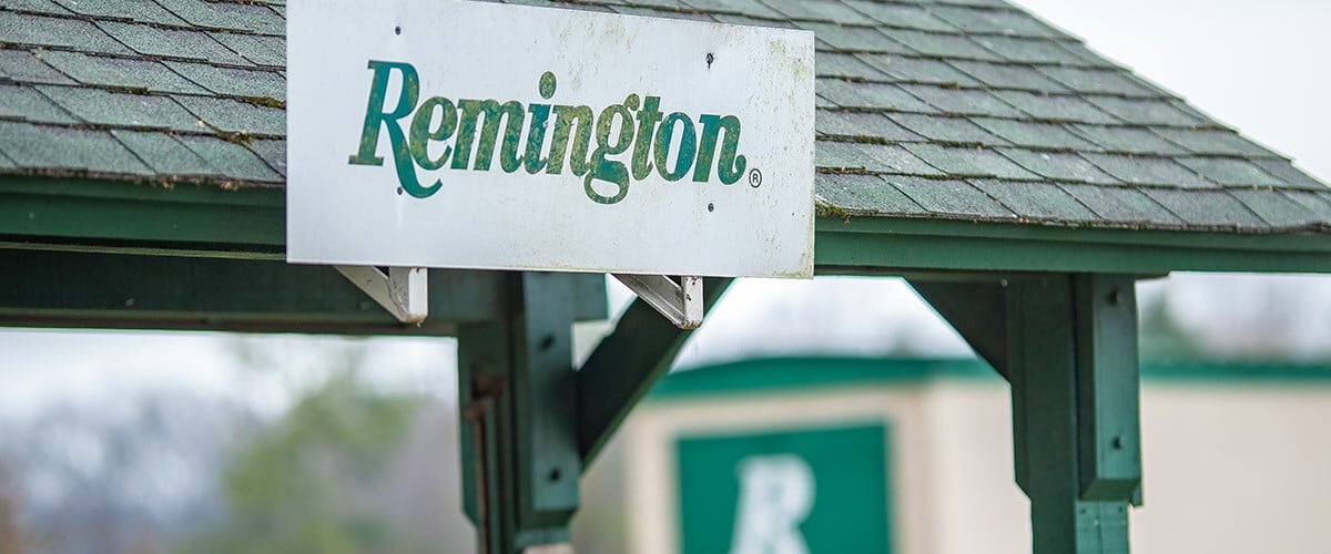 Remington logo on a sign above a shelter at the Remington Gun Club