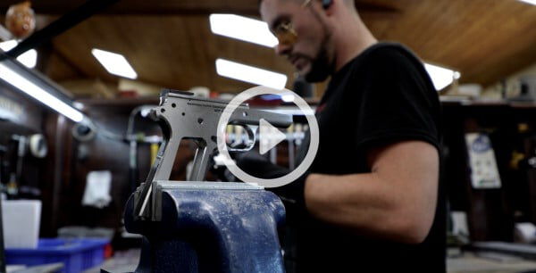 handgun part in a vice