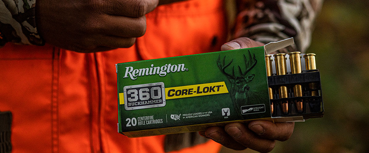 hunter holding a box of Core-Lokt 360 Buckhammer