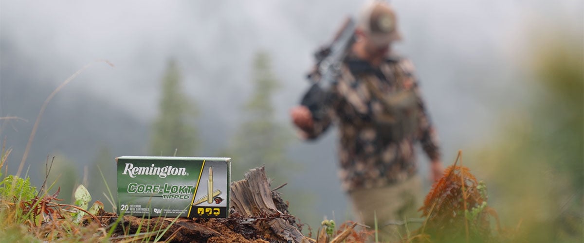 Core-Lokt Tipped box with a hunter in the background