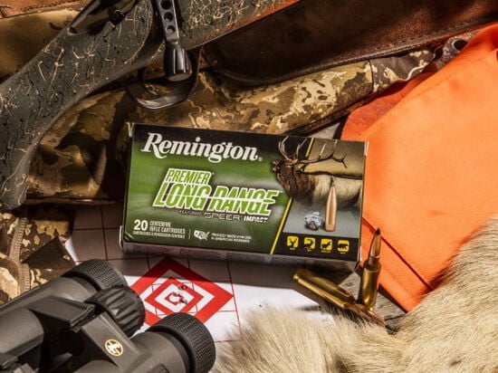Premier Long Range packaging on a table with a rifle