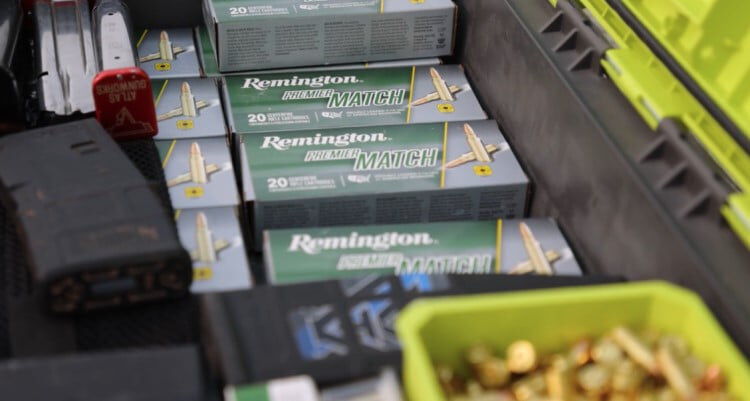 Remington Premier Match boxes, magazines and cartridges in a gear box