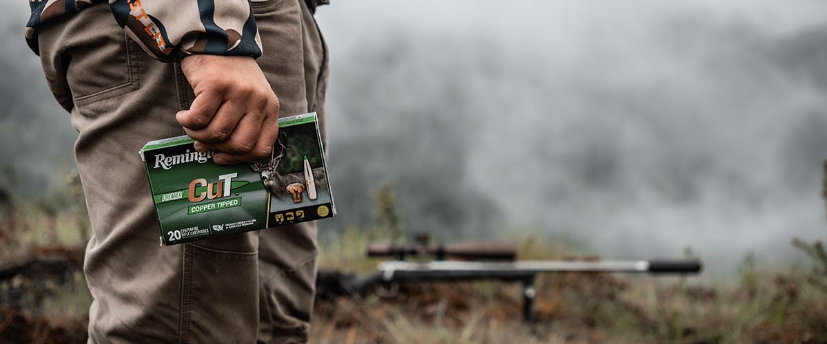 hunter holding box of Premier CuT