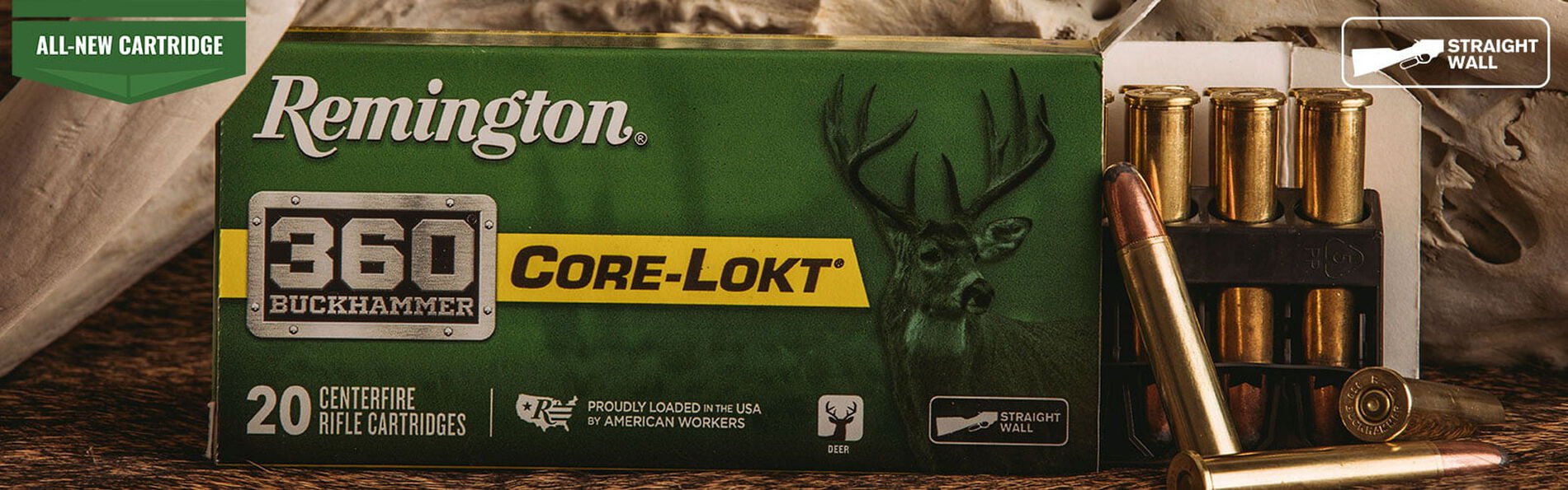 Opened Core-Lokt box sitting amoungst a deer skull with New Cartridge downward green arrow and straight all badge