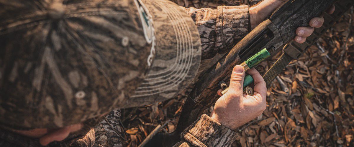 Remington Shotshell being loaded into a shotgun