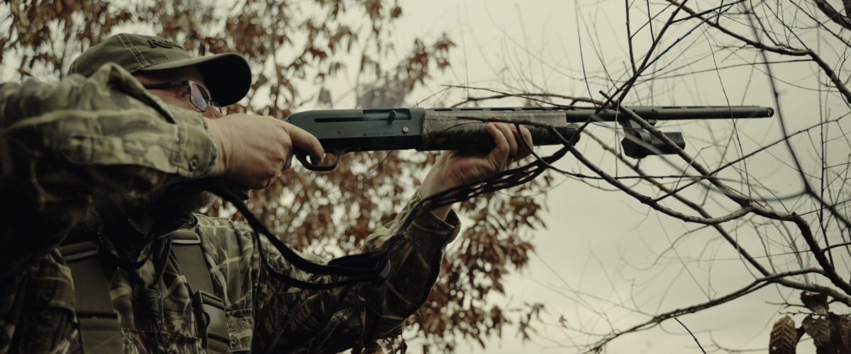 Waterfowler with 12 gauge shotgun