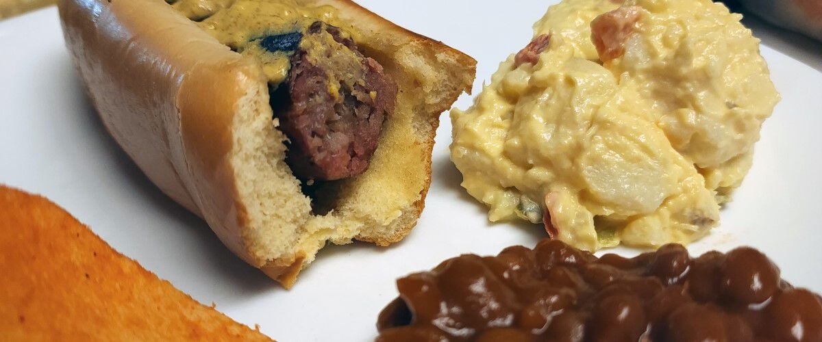 Deer Beer Brat with potato salad and baked beans