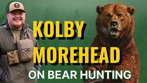 Kolby Morehead and a bear